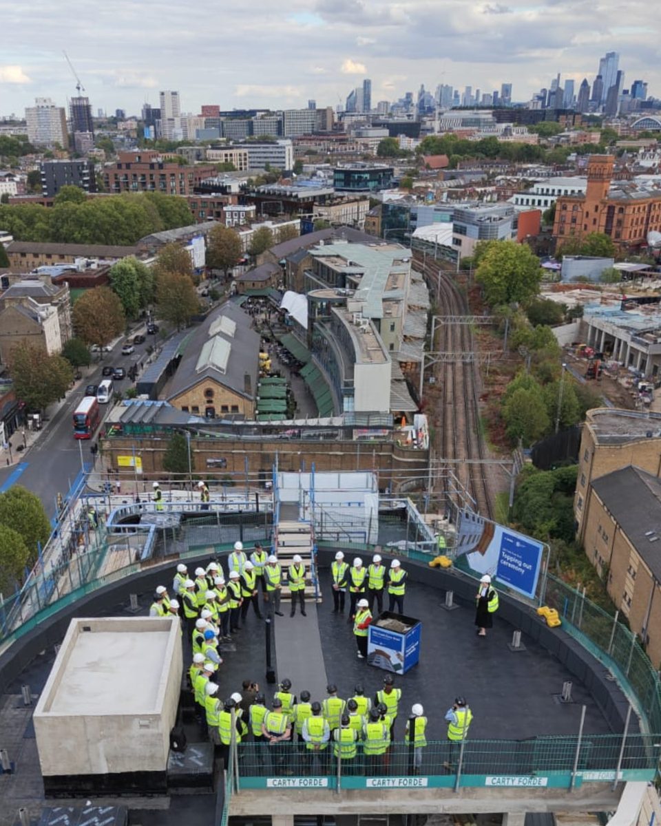 A topping-out gathering at Arada London’s 100 Chalk Farm Road development in Camden marks construction reaching its planned maximum height, with the project set to deliver 30 social rent homes for Clarion Housing Group.
