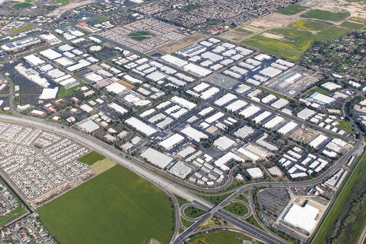 Aerial view of North Market Industrial Park in Sacramento’s Natomas submarket, the 28-building, 1.9-million-square-foot portfolio acquired by Blue Rise Ventures and DRA Advisors.