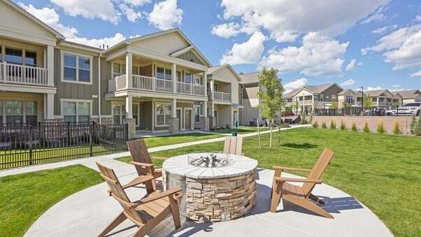 A suburban multifamily community with direct-access homes and shared outdoor amenities illustrates the type of workforce housing Continental Properties plans to develop through its $203 million Development Fund IV.