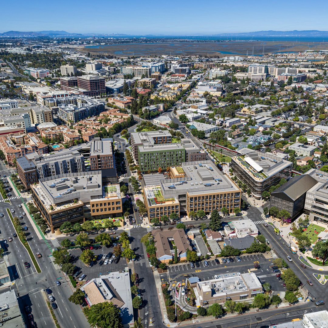 An aerial view of the ELCO Yards mixed-use district in Redwood City, where High Street Residential and Barings are developing two apartment buildings with 501 units.