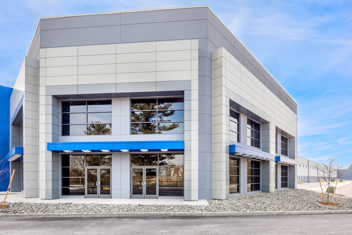The modern exterior of Worcester Distribution Center, the Class A industrial property acquired by JLL Income Property Trust for approximately $90 million near Boston.