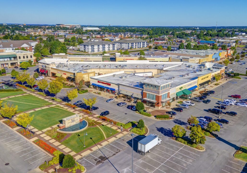 Aerial view of Midtown Village in Tuscaloosa, the 345,000-square-foot open-air shopping center acquired by JLL Income Property Trust for approximately $94 million.