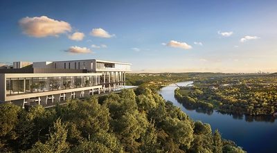 Rendering of Four Seasons Private Residences Lake Austin overlooking Lake Austin, the lakefront development at 6509 Bridgepoint Pkwy that JLL arranged an $870 million senior construction loan to finance.
