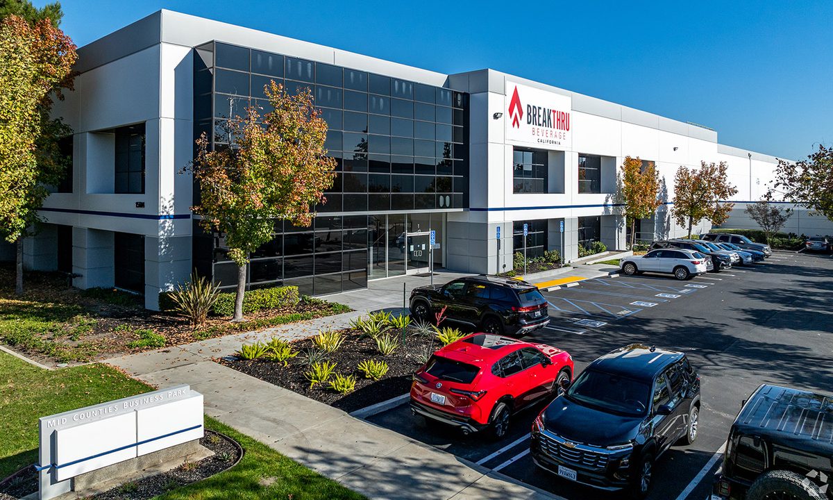 The Shoemaker Commerce Center in Santa Fe Springs, identified by Breakthru Beverage signage, was acquired by JPMorgan Chase from PGIM Real Estate for $176.5 million.