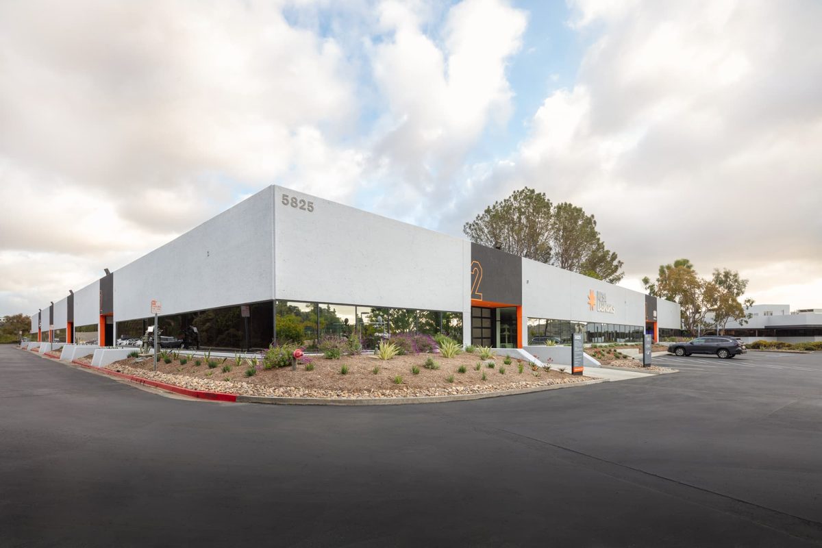 Exterior corner view of the Mesa Labworks building in Sorrento Mesa, San Diego, showing the building number '5825' and Mesa Labworks campus signage.