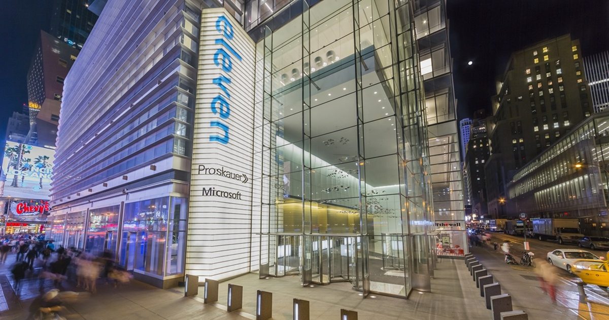 11 Times Square, identified by the Proskauer Rose signage, is cited in the article as the site of a larger lease and expansion that ranked alongside Morgan, Lewis & Bockius’ 205,000-square-foot deal at 1251 Sixth Ave.