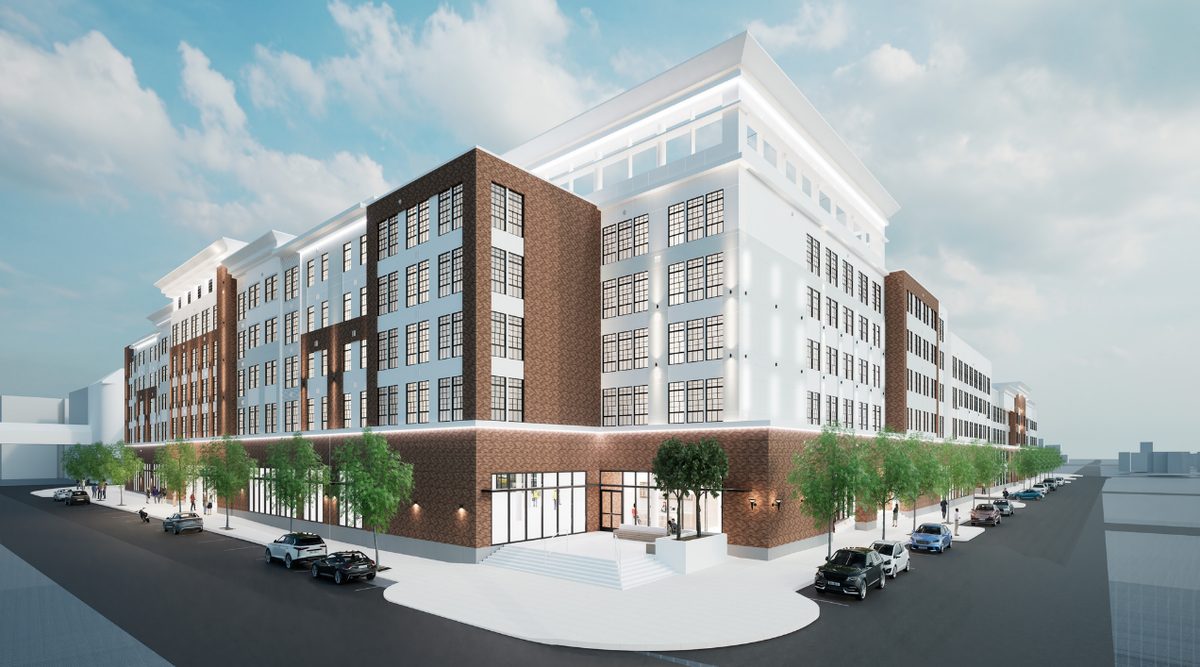 Architectural rendering of Station Yards Phase 2C in Ronkonkoma, showing the planned three five-story buildings that will deliver 285 apartments and ground-floor medical office space where Northwell Health will occupy 30,000 square feet.