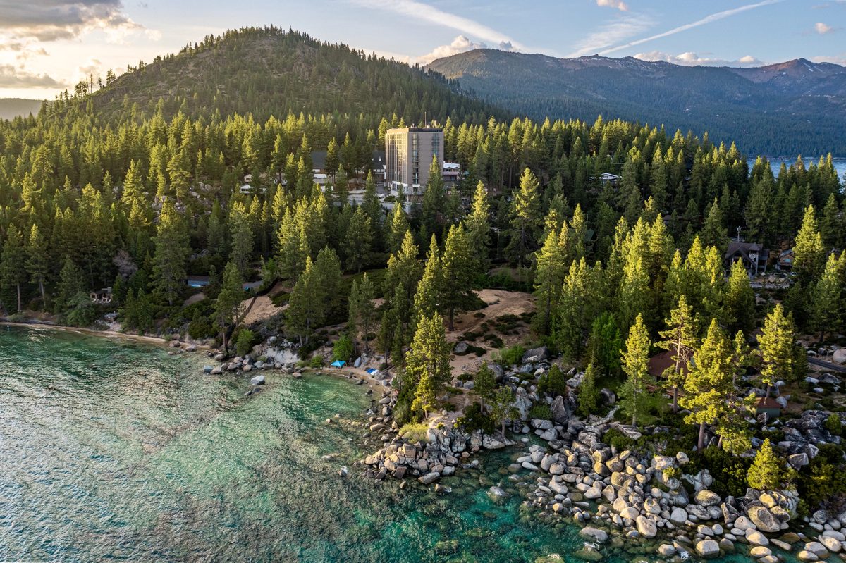 An aerial view of the lakeside Cal Neva property at Lake Tahoe, which Realberry and Proper Hospitality are redeveloping into the proposed Lake Tahoe Proper Resort and Casino through a $298 million financing package.