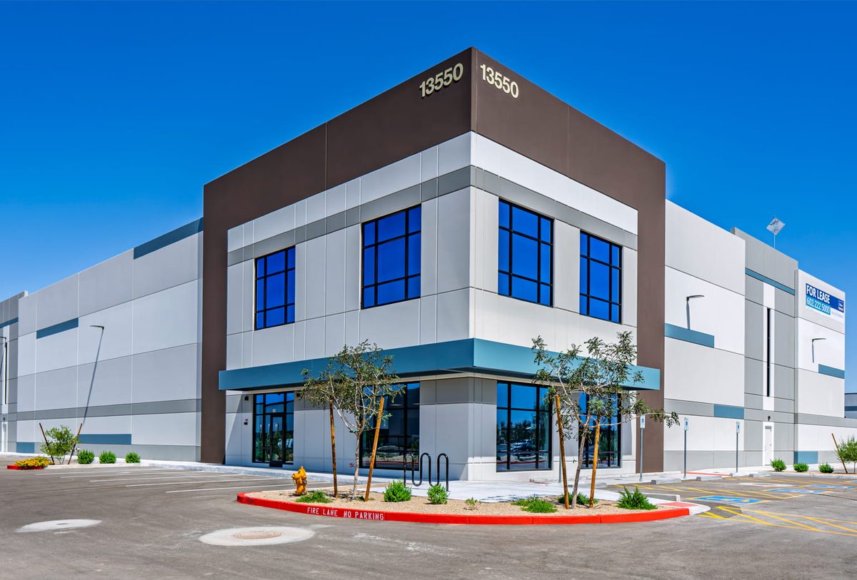 Exterior of Level Crossing 3 in the Surprise Railplex, the 150,615-square-foot industrial building where Ship Daddy leased 79,420 square feet, showing the facility’s modern façade and curbside access that support omnichannel fulfillment operations.