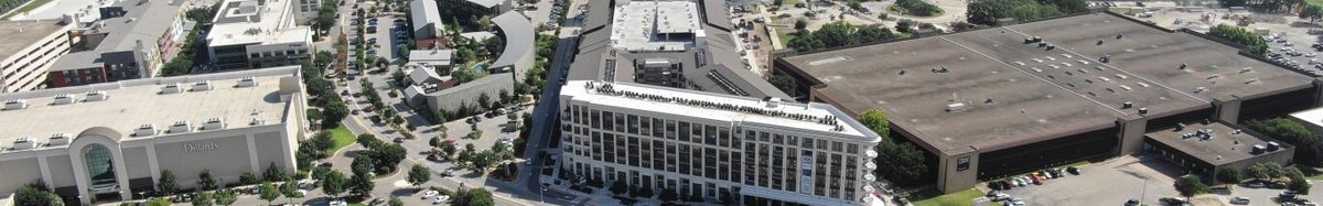 Aerial view of commercial and industrial real estate, illustrating the logistics-focused investment strategy of Stonelake Capital Partners’ $1 billion Opportunity Partners VIII fund.