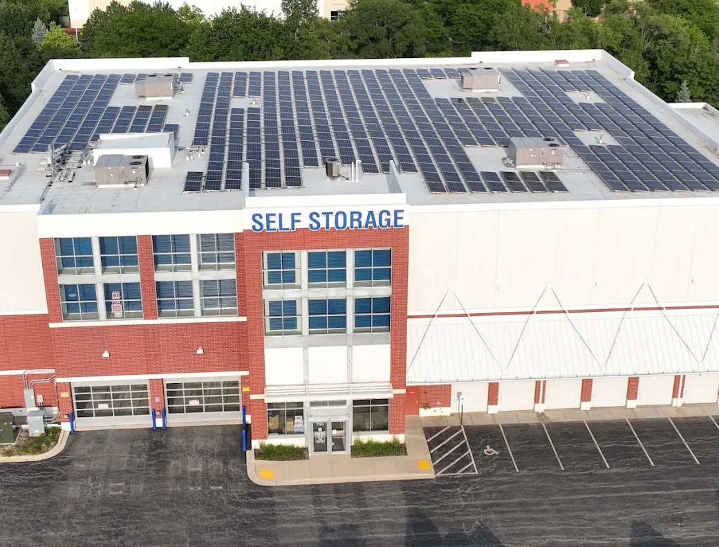 A BRB Development self-storage facility, showing rooftop solar arrays and prominent “SELF STORAGE” signage, representative of the six-property portfolio for which Talonvest Capital arranged the $48 million refinancing package.